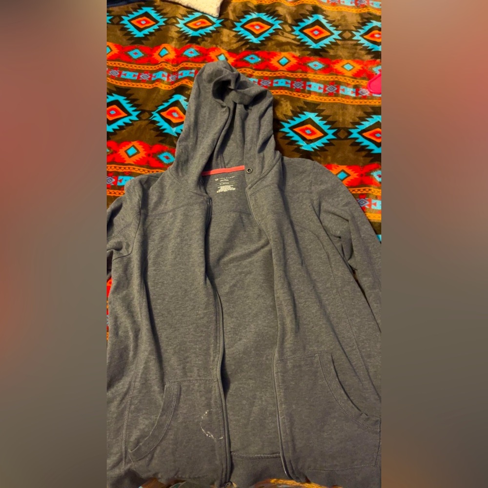 Nice jacket for begging of fall, has a little white paint stain